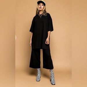 Dressed in LALA original playsuit. Top and bottom Black size M